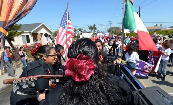 Hundreds of people march through the streets of Oxnard, Calif., for immigration reform and to honor the legacy of Cesar E. Chavez, founder of the United Farm Workers of America, on March 24, 2013.