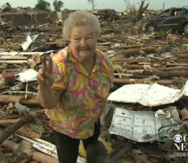 Tornado Survivor Finds Her Missing Dog in the Rubble of Her Home During a TV Interview