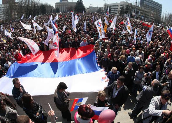 483055287-pro-russian-protesters-hold-russian-national-flags