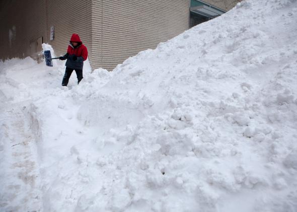 462407626-workers-continue-snow-removal-efforts-in-the-back-bay