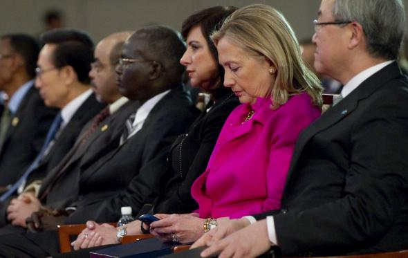 134272681-secretary-of-state-hillary-clinton-checks-her