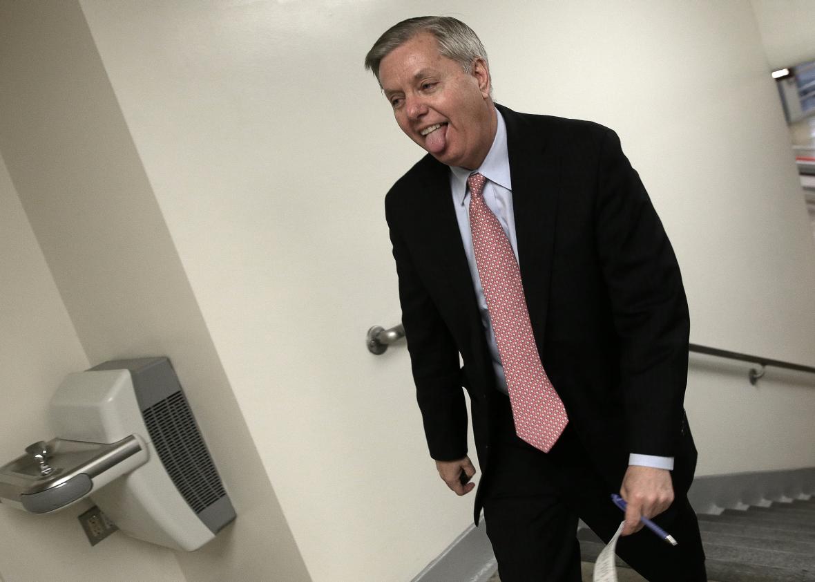 465226120-sen-lindsey-graham-rushes-to-the-senate-chamber-to-vote