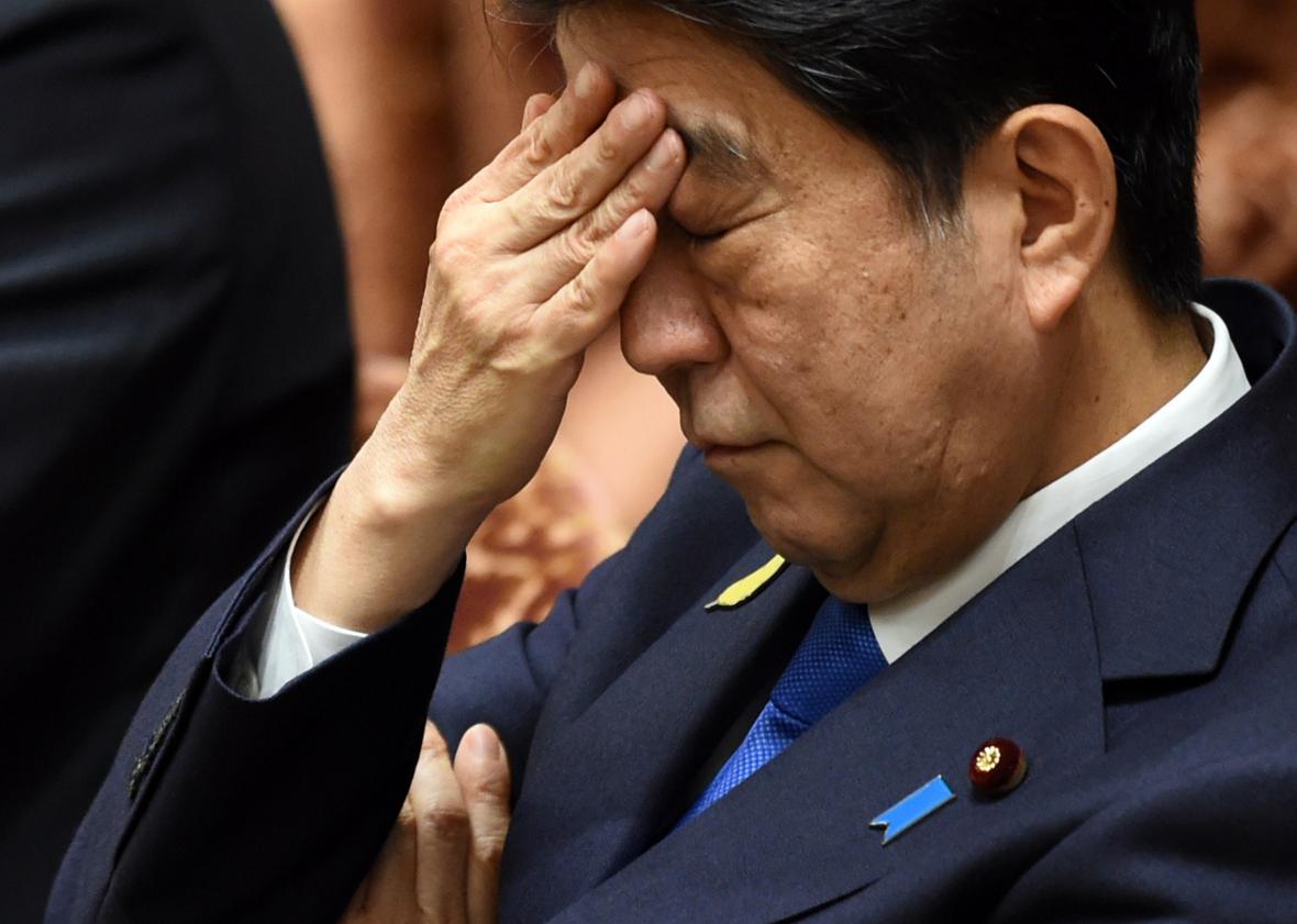 479284952-japanese-prime-minister-shinzo-abe-gestures-while