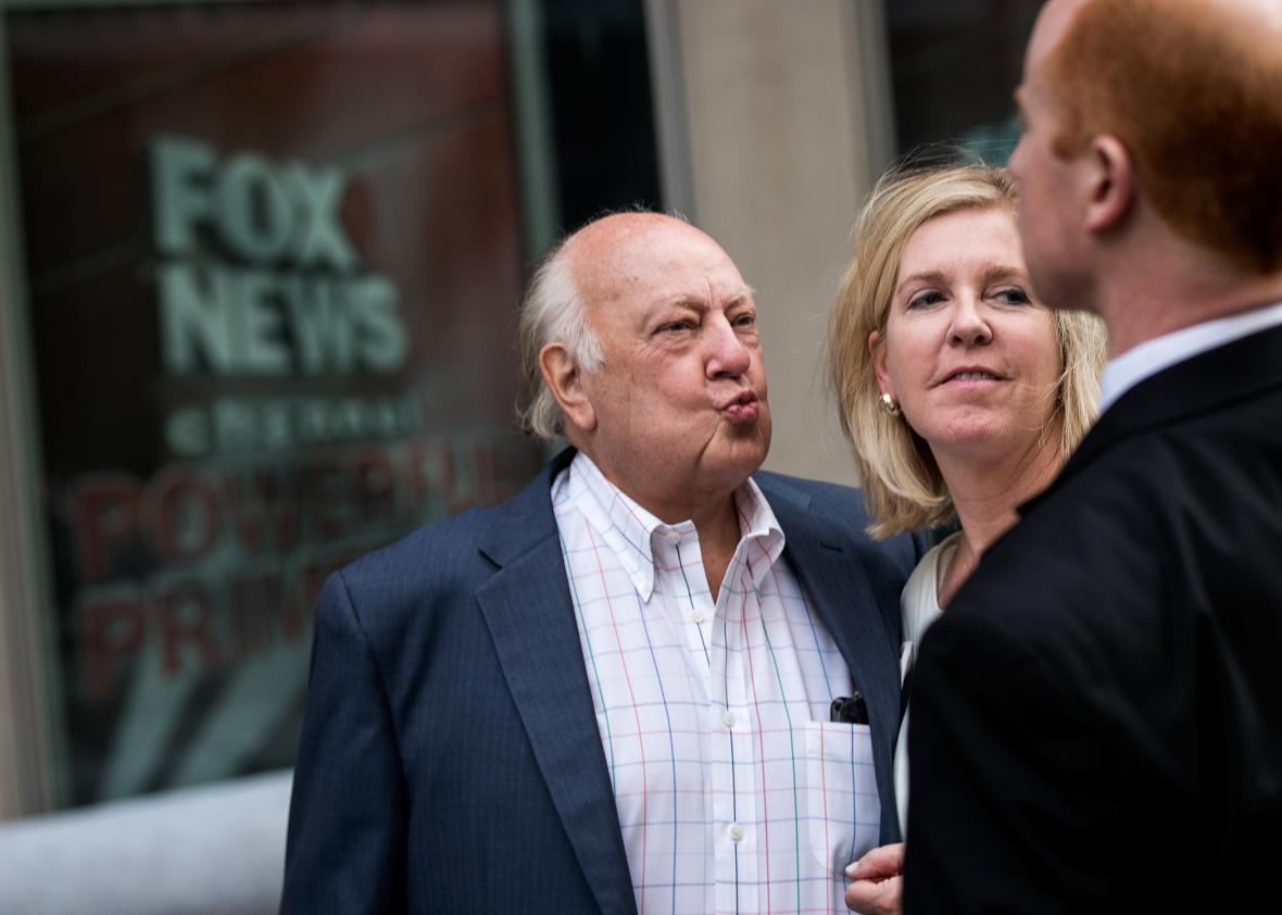 577708184-fox-news-chairman-roger-ailes-walks-with-his-wife