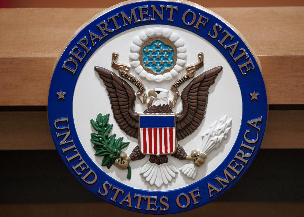 452318381-the-us-department-of-state-seal-is-seen-on-the-podium