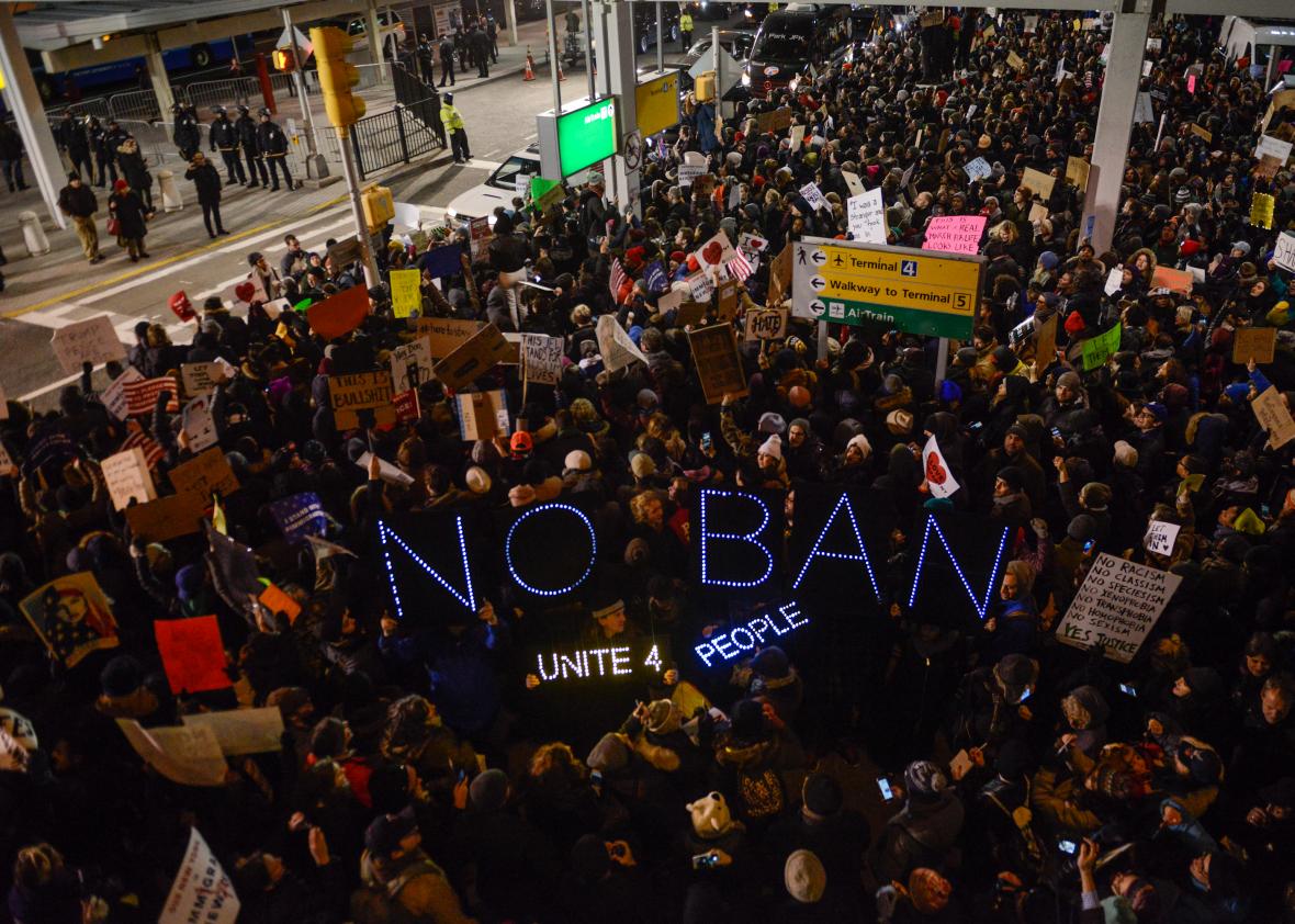 Protesters rally during a demonstration against the Muslim immigration ban at John F. Kennedy International Airport on Saturday in New York City. (Stephanie Keith/Getty)