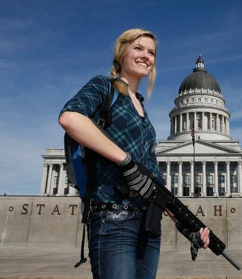 162972470-darci-lund-carries-an-ar-15-at-a-gun-rights-rally-and