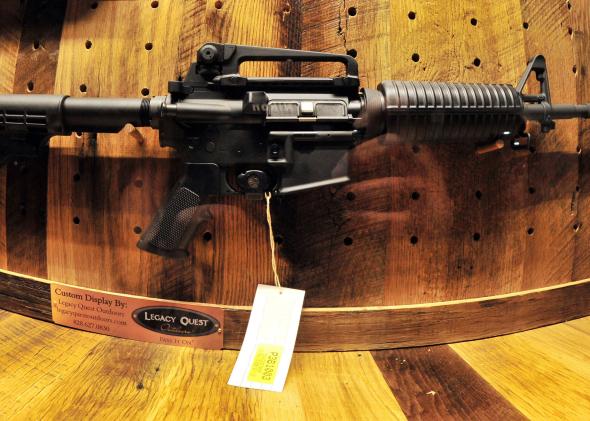 168153102-an-ar-15-rifle-to-be-raffled-off-is-seen-at-the-wall-of