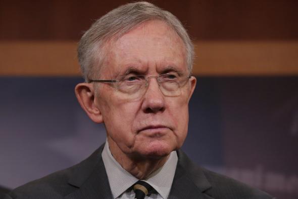 487457885-senate-majority-leader-harry-reid-answers-reporters