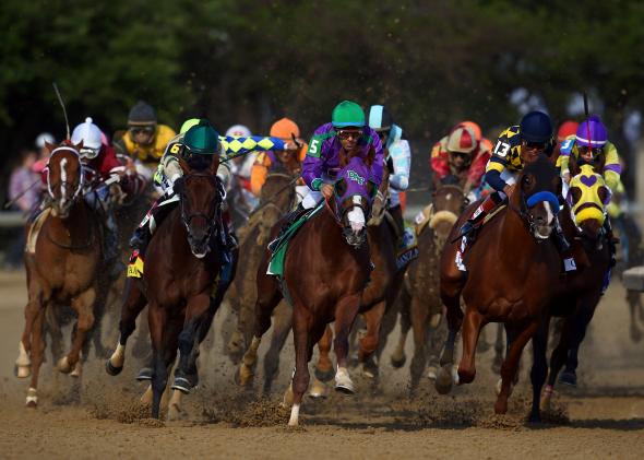 488466335-jockey-victor-espinoza-guides-california-chrome-to-the