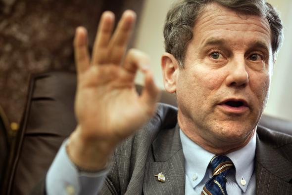 108743604-sen-sherrod-brown-answers-reporters-questions-during-a