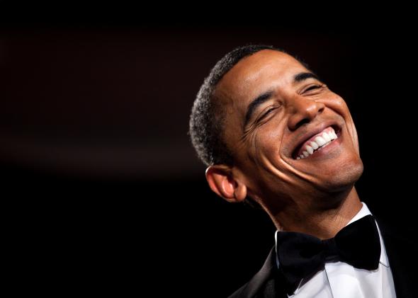 130771981-president-barack-obama-smiles-while-speaking-during-the