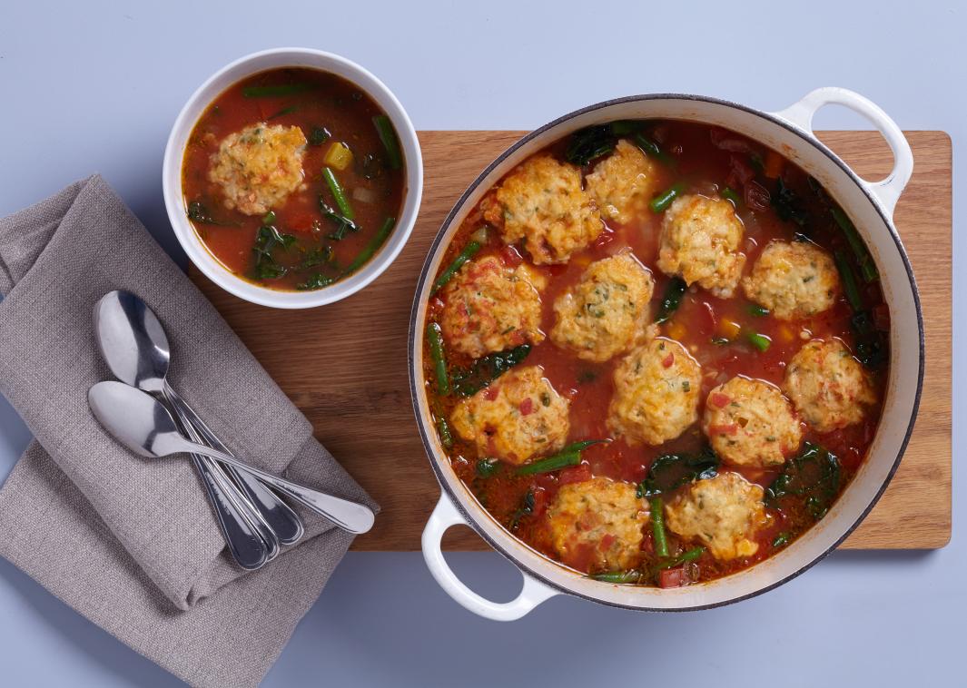 Tomato Vegetable Soup with Cheddar Cheese Dumplings