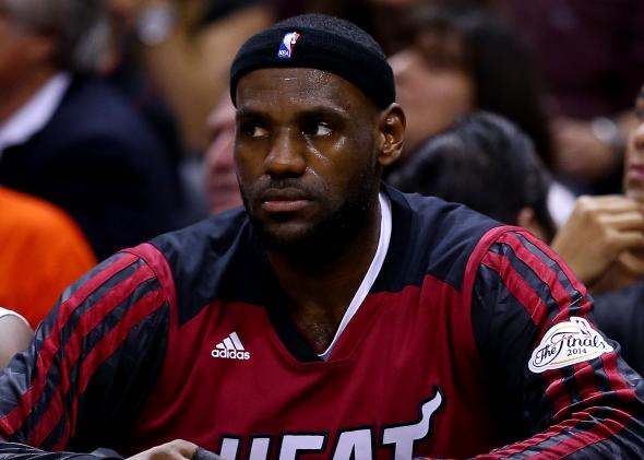 451158268-lebron-james-of-the-miami-heat-hydrates-on-the-bench