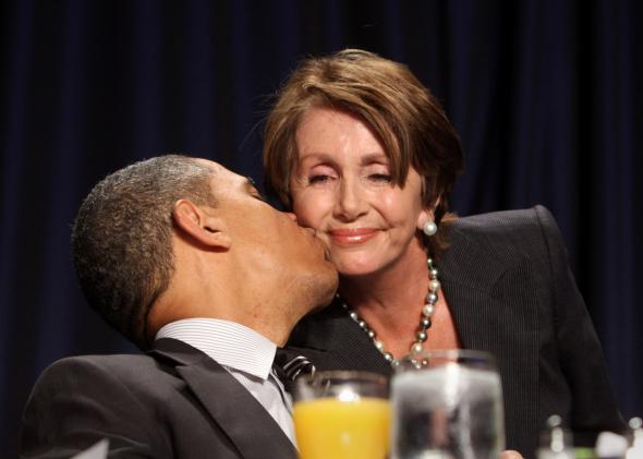 138083665-house-minority-leader-rep-nancy-pelosi-receives-a-kiss