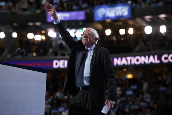 580961586-sen-bernie-sanders-acknowledges-the-crowd-before