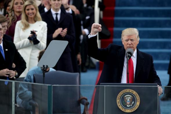 632196052-president-donald-trump-raises-a-fist-after-his