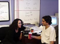 Senior producer Arun Rath and me in front of the Big Board