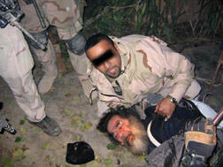 Saddam's capture. Click image to expand.