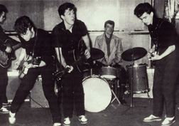The Silver Beetles audition session: Stuart Sutcliffe, John Lennon, Paul McCartney, Johnny Hutchinson, and George Harrison, May 1960.. Click image to expand.