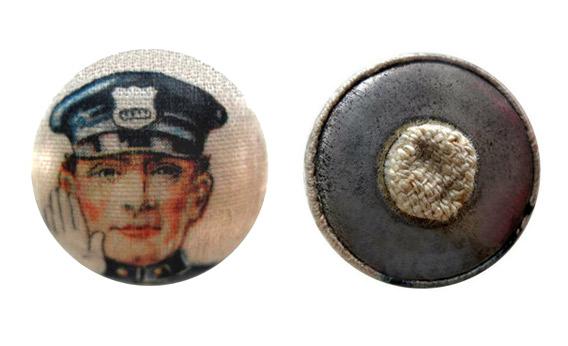 A fabric-printed garter button, used by flappers to hold up their newly-visible stockings.