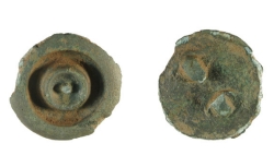 Prehistoric copper-alloy button, dating from the late Bronze Age, circa 900 BC, to the early Iron Age, circa 43 AD.