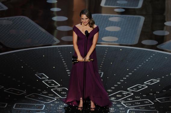 Actress Natalie Portman accepts the award for Best Performance by an Actress in a Leading Role for 'Black Swan'.
