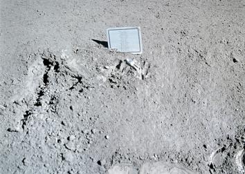 A close-up view of a commemorative plaque left on the moon at the Hadley-Apennine landing site in memory of 14 NASA astronauts and USSR cosmonauts, now deceased. 