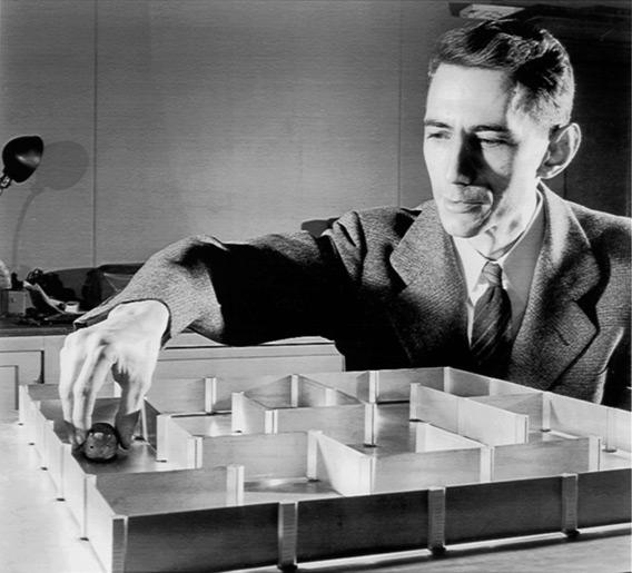 Claude Shannon's electromechanical mouse, Theseus, navigates a maze.