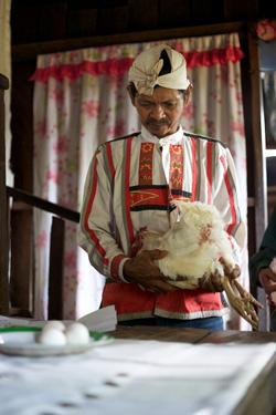  The ritualist prepares to do his work.