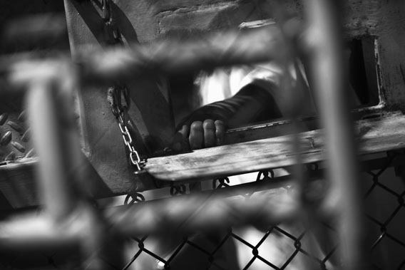 A detainee waits for lunch inside the U.S. detention center for &quot;enemy combatants&quot; on September 16, 2010 in Guantanamo Bay, Cuba.