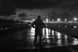 130411_FOR_slahi28 A U.S. Navy sailor looks towards the Guantanamo Bay detention center on March 30, 2010 in Guantanamo Bay, Cuba.