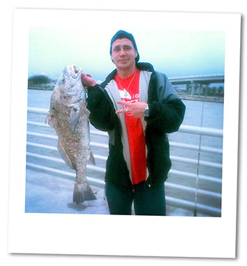 Gary Brown and a fish he caught soon after his release from pris