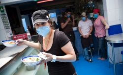 During the outbreak of the H1N1 virus in Mexico City, many restaurant workers came to work in protective masks to stop the spreading of the virus.