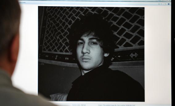 A man looks in Moscow on April 19, 2013, at a computer screen displaying an undated picture the 19-year-old Dzhokhar Tsarnaev posted on his is page in VKontakte, a Russian social media site.