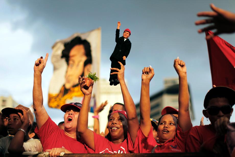 Supporters of Venezuelan President Hugo Chavez attend the closing campaign rally of United Socialist Party of Venezuela in Caracas September 23, 2010. Venezuela's opposition is certain to make gains in parliamentary elections on Sunday but probably not enough to wrest legislative control from President Hugo Chavez in the 12th year of his socialist &quot;revolution.&quot; 