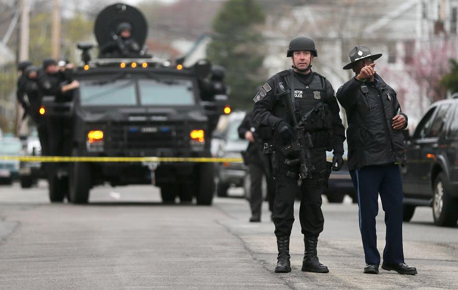 SWAT team members prepare to search for one remaining suspect at an apartment building on April 19, 2013 in Watertown, Massachusetts. 
