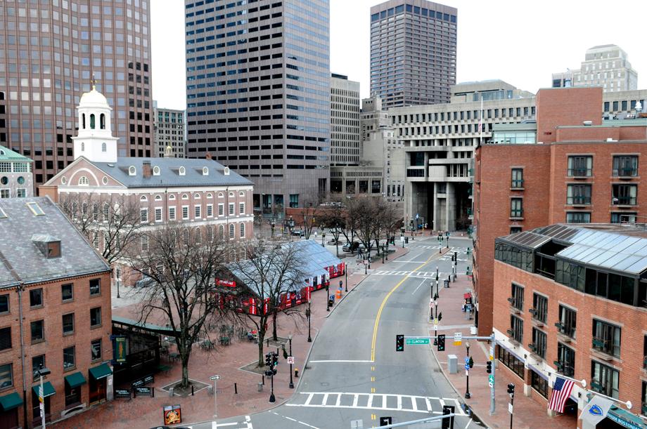 An empty street is seen near the historic Faneuil Hall (on L, with white cupola) and City Hall (back, in C) in Boston, Massachusetts on April 19, 2013, as the manhunt continues for Dzhokar Tsarnaev, the remaining suspect in the Boston Marathon bombings. Police killed one suspect in the Boston Marathon bombing, Tamerlan Tsarneav, in a shootout and mounted house-to-house searches for the second man, his brother Dzhokar Tsarnaev, on Friday, with much of the city under virtual lockdown after a bloody night of shooting and explosions in the streets.
