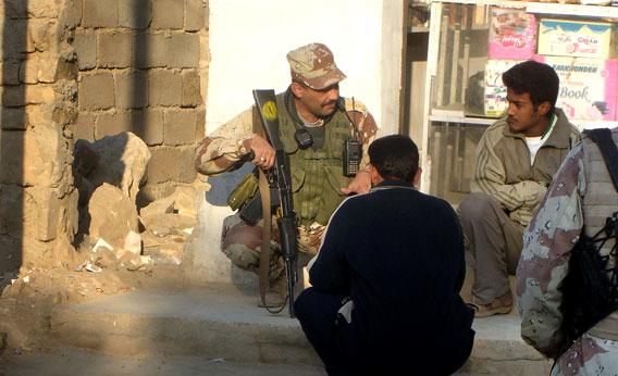 Capt. Haadi chatting with locals