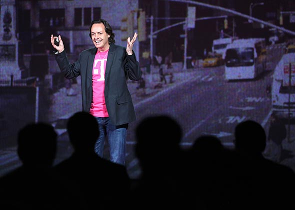 John Legere, CEO and President of T-Mobile USA, makes an announcement during an event about new contract pricing on March 26, 2013 in New York City.