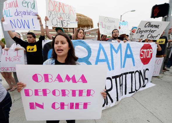 170139221-perla-montes-and-fellow-protestors-hold-signs-during-a_1