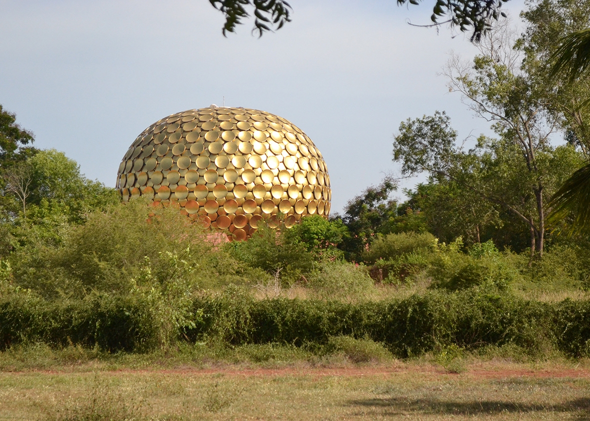 The Matrimandir, otherwise known as &quot;the soul of Auroville,&quot; is a large meditation chamber built from gold-plated leaves. It sits at the center of the township.