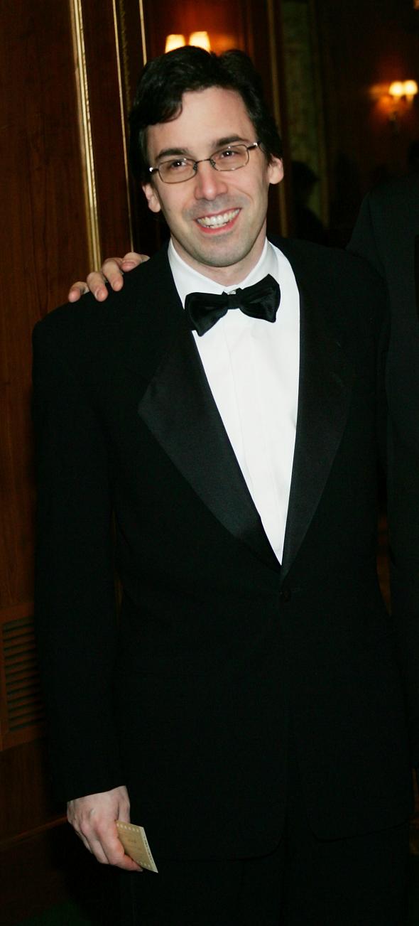 52219759-writer-tony-kushner-and-companion-mark-harris-attend-the