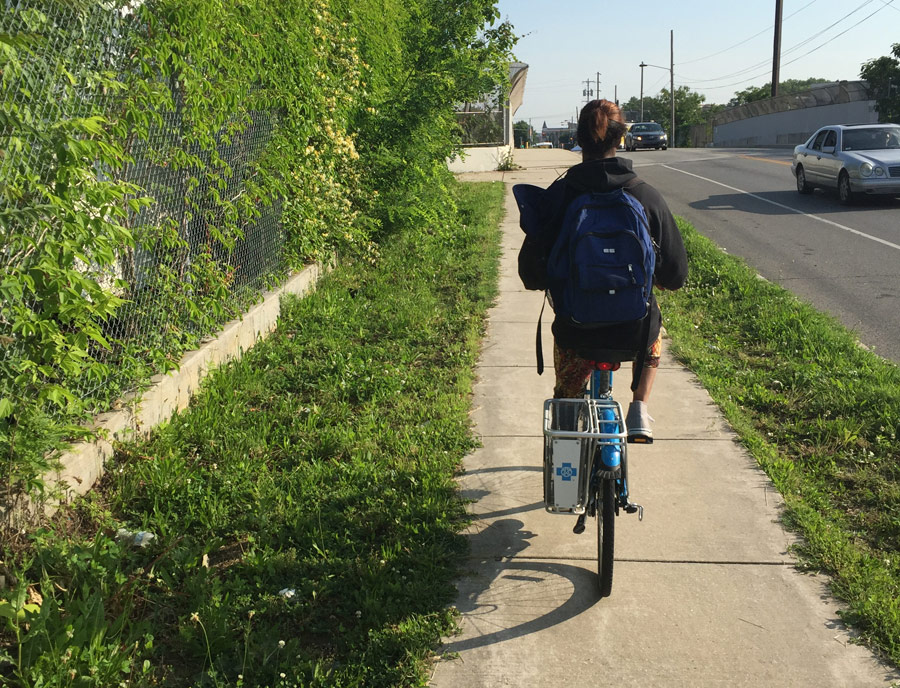 After the 2-mile bike journey, Hill will take another bus to her first job of the day, doing landscaping work as an assistant crew leader with PowerCorps. 