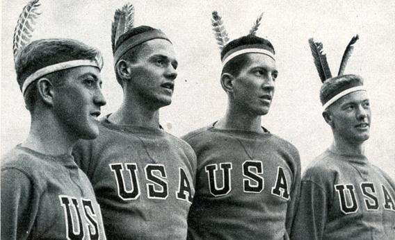 This photo, published in a German cigarette company's review of the Olympics, shows Robert Moch, Gordon Adam, John White, and Joe Rantz in Indian headdresses. 
