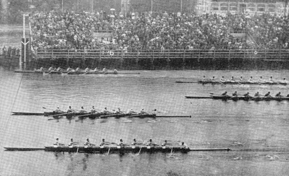 The American crew (top) crosses the finish line first. 