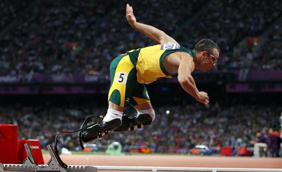 Oscar Pistorius of South Africa starts on the blocks in the Men's 400m Semi Final.