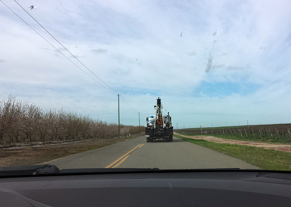 water well drilling truck through a maze of almond orchards as we made our way back to the highway.