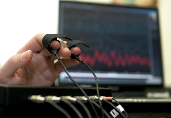73507475-computerized-polygraph-machine-being-used-in-a-simulated 73507475-computerized-polygraph-machine-being-used-in-a-simulated