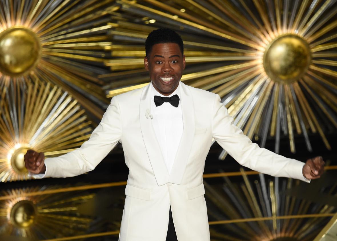 512945848-host-chris-rock-speaks-onstage-during-the-88th-annual